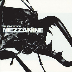 Massive Attack — Mezzanine (1998). The record that defined trip-hop's darkest register: "Angel," "Teardrop," "Risingson" — Robert Del Naja's project at its most cinematic and unsettling. Returning to Fuji Rock for the first time since headlining in 2010, Sunday Green Stage closer.